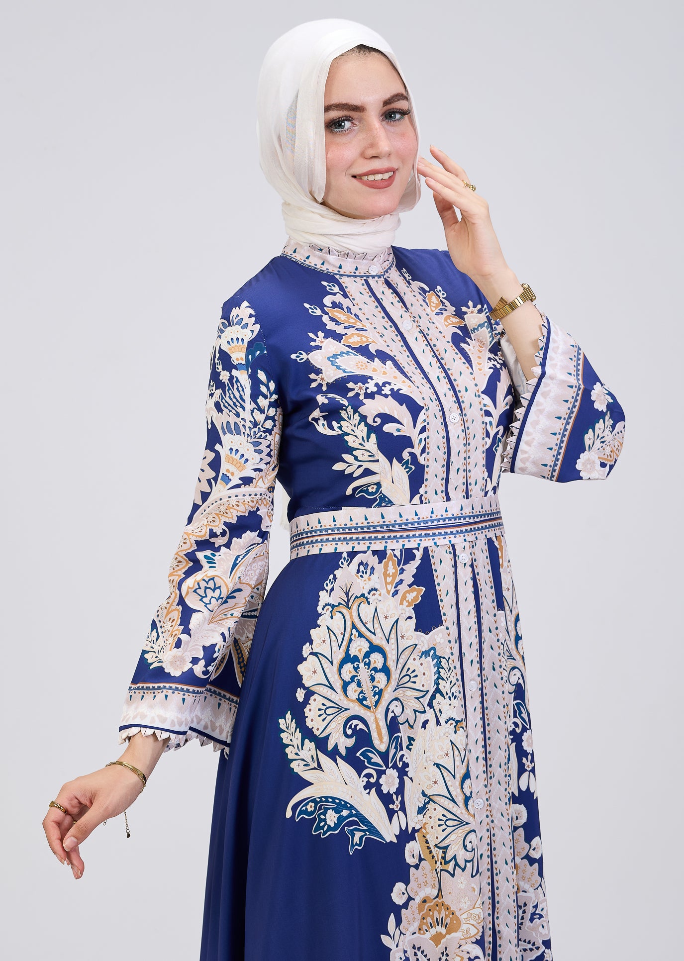 Close-up of kimono sleeves on royal blue floral modest dress