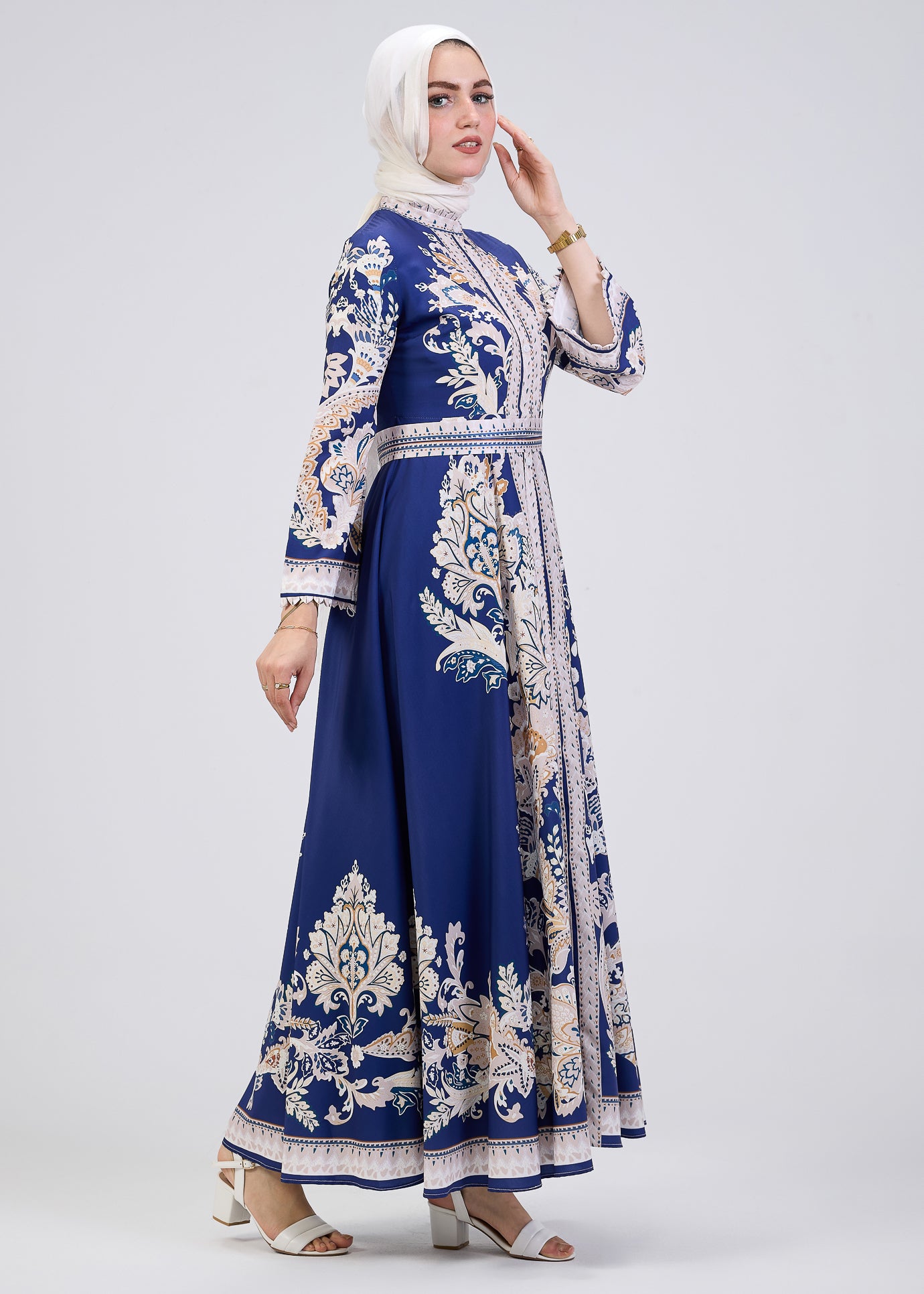 Detail view of floral pattern on royal blue modest dress