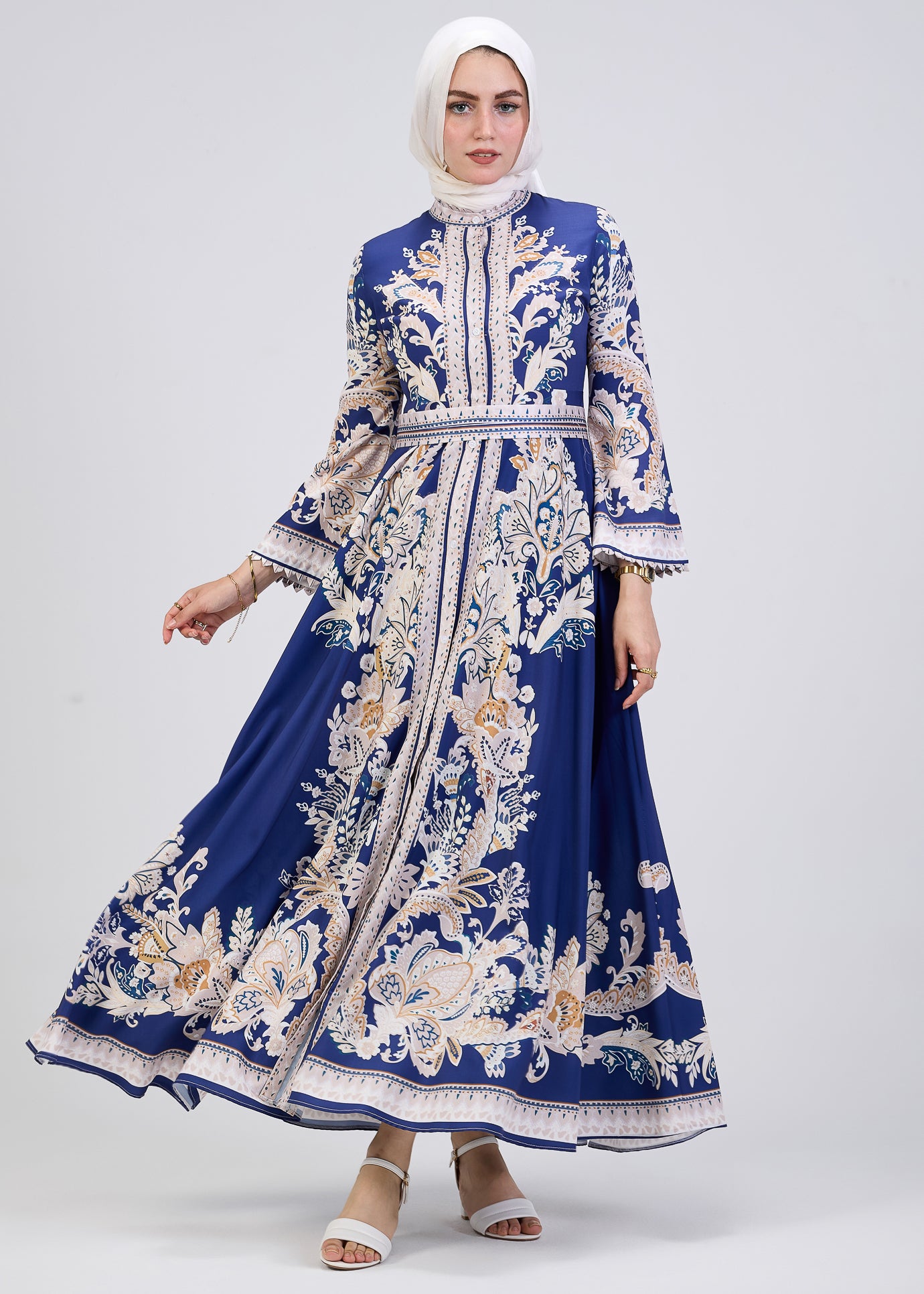 Full-length view of royal blue floral modest satin dress