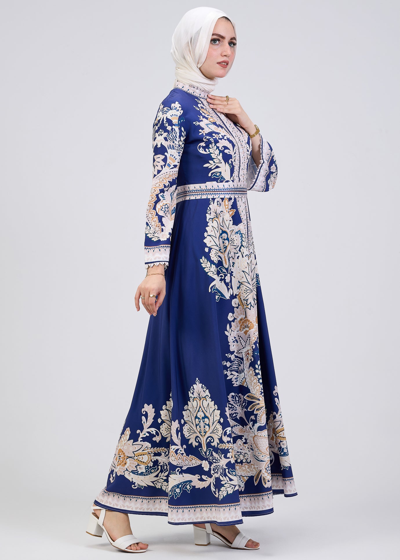 Side view of royal blue floral modest dress with kimono sleeves