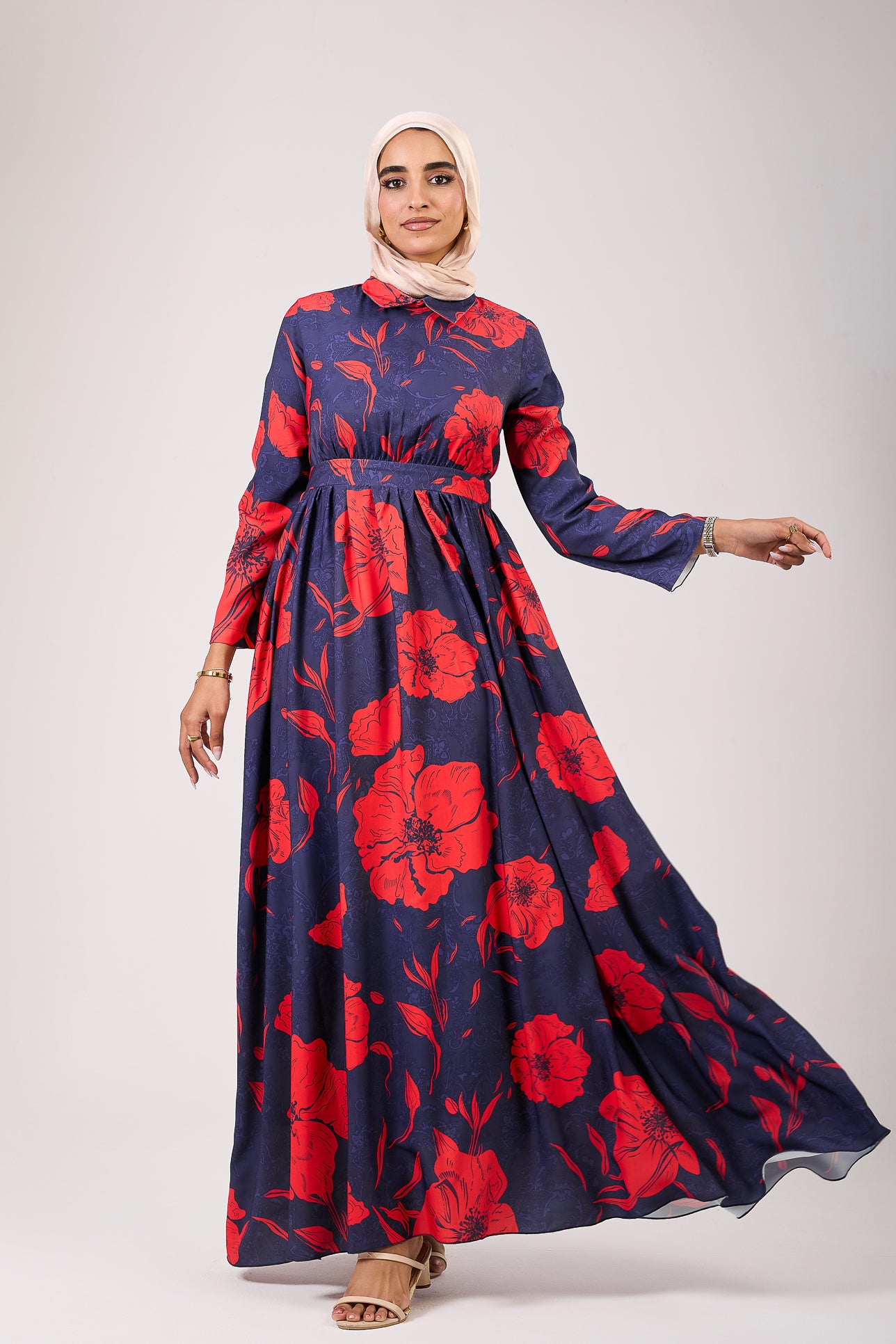 Side view showcasing the flow of the floral maxi dress