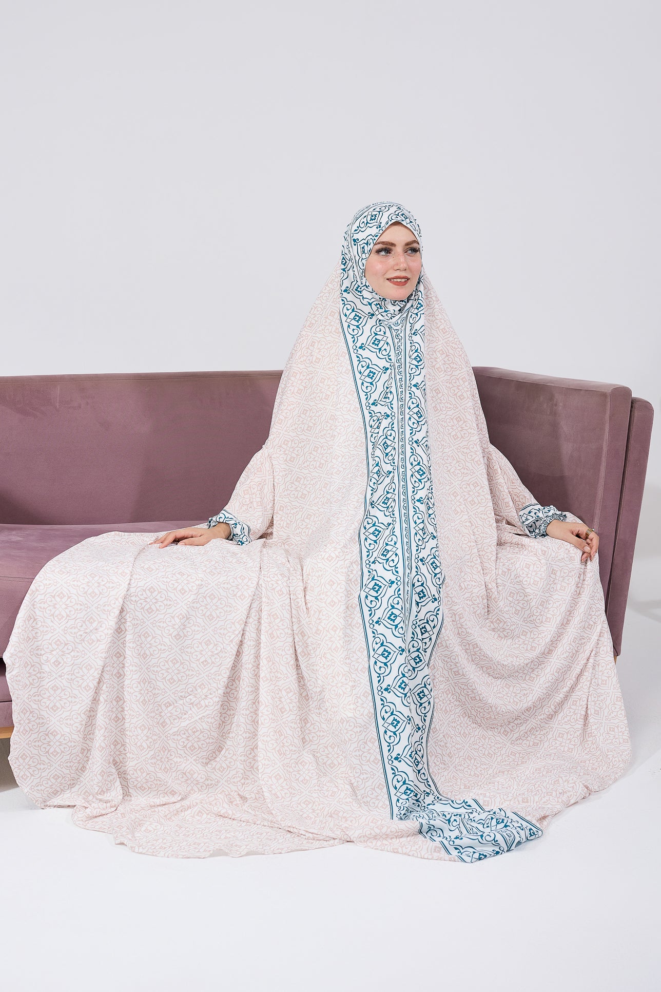 Front view of satin home prayer gown in blue Moroccan print