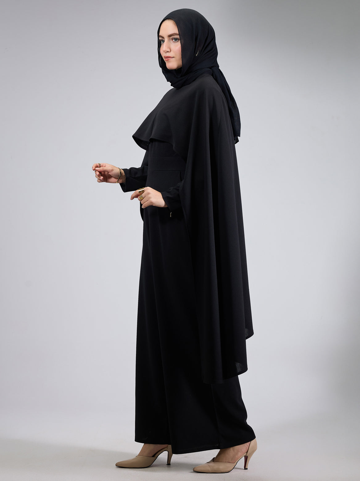 Full-body look of the modesty dress with wide-leg trousers