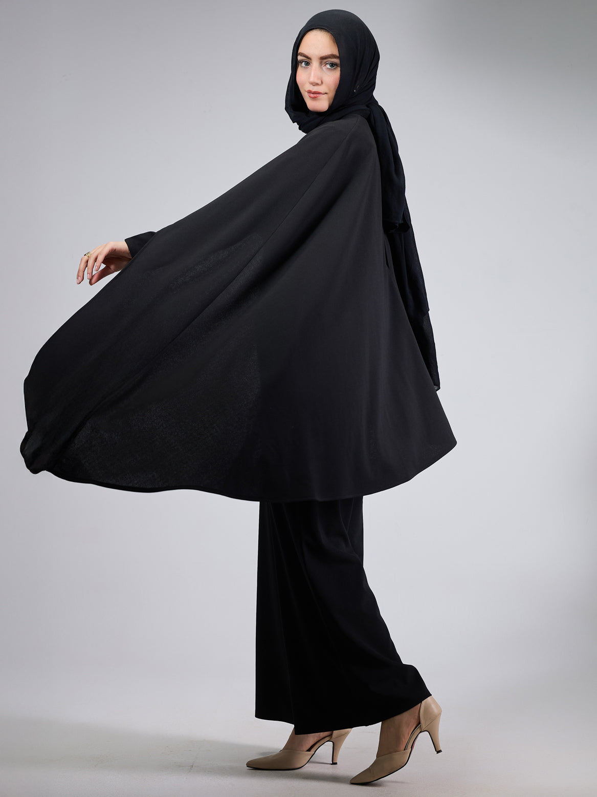 Minimalist view emphasizing the sleek black crepe fabric