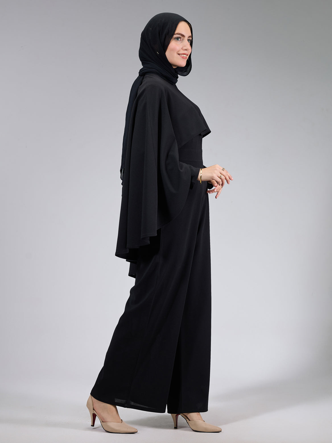 Side view showcasing the cape of the modesty dress