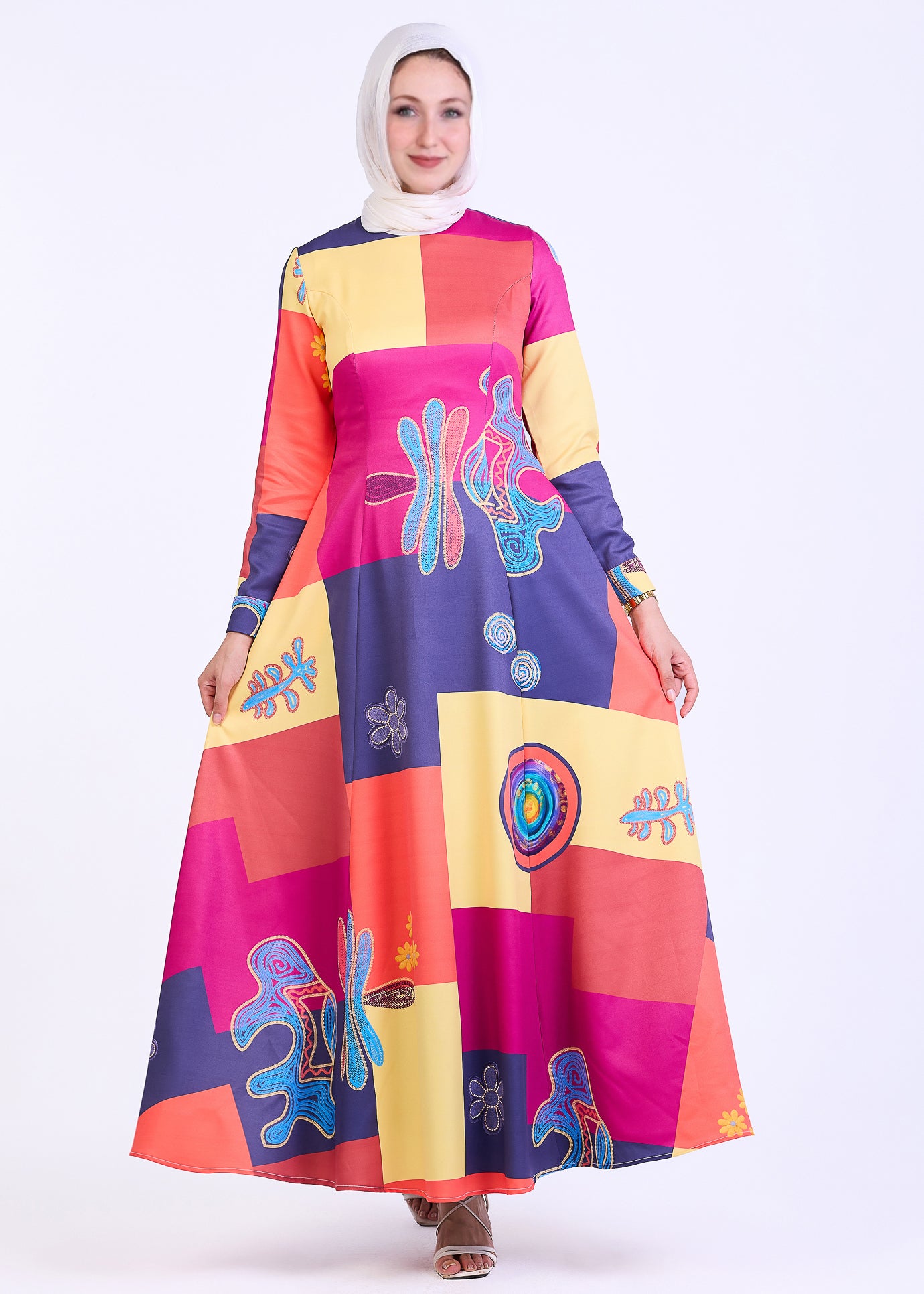 Front view of vibrant patchwork crepe maxi dress with abstract print