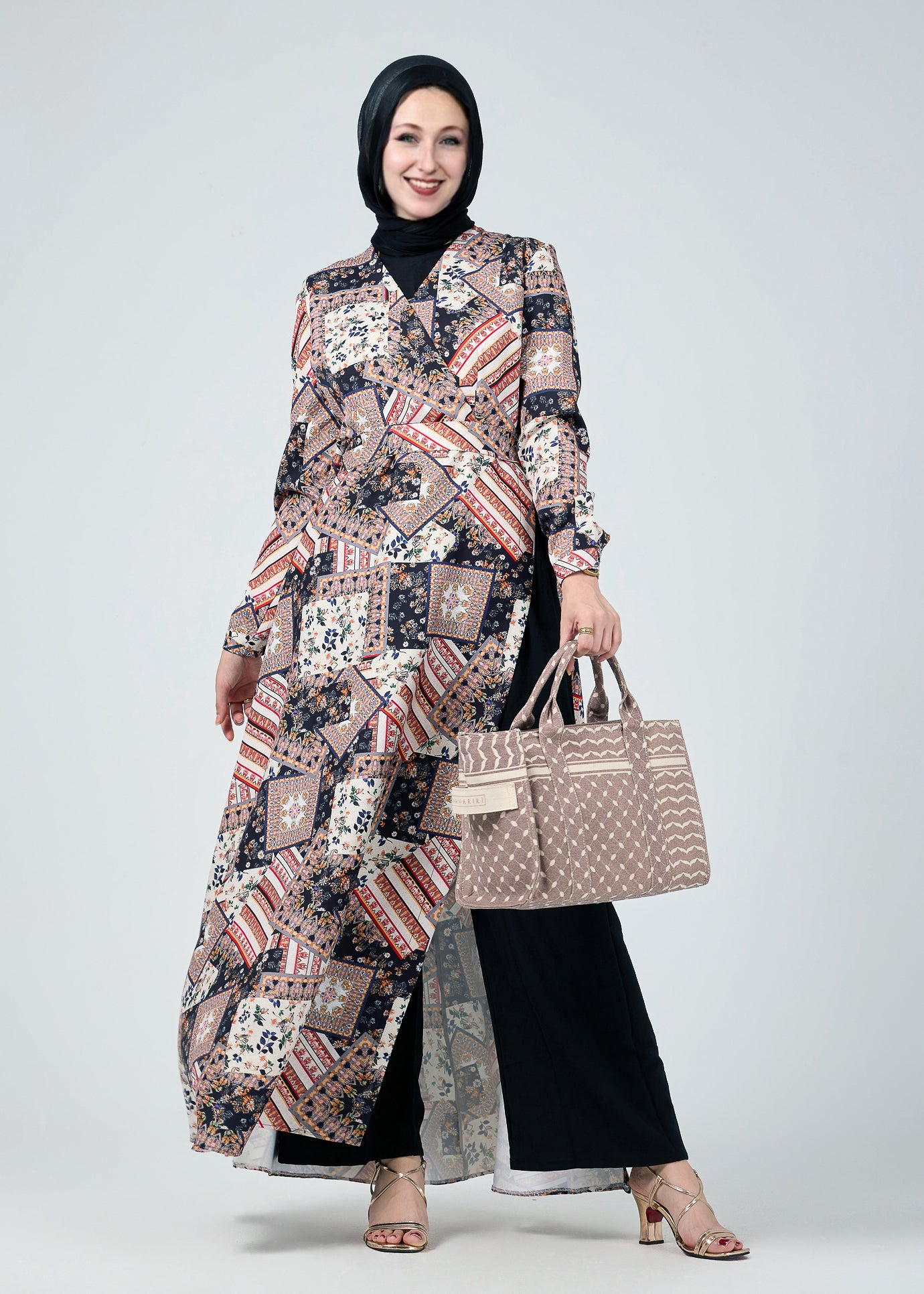 Flowing silhouette of the Vienna Mosaic Printed Wrap Maxi Dress