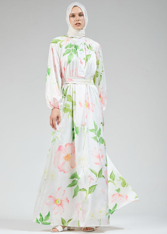 Side view of the white floral satin dress with long sleeves
