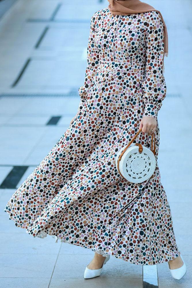 Close-up of the fabric texture on the Dotted Delight Maxi Dress