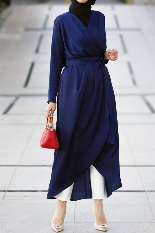 Hala satin maxi uneven cut dress with long sleeve and wrap detail waist and belt in blue - ANNAH HARIRI