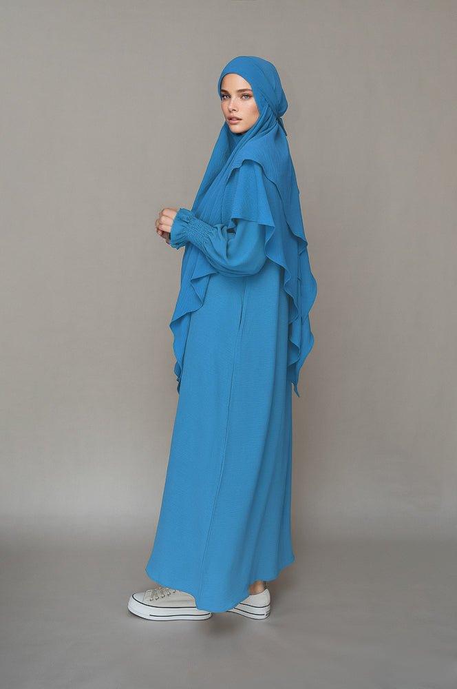 Front view of Light Blue Non-Wrinkling Maxi Dress by Annah Hariri