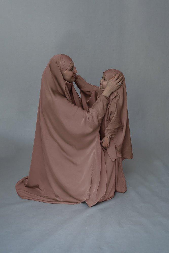 Back view of the Light Pink Satin Prayer Gown and khimar set