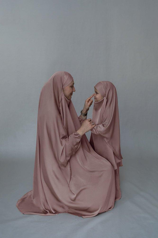 Side view of the Light Pink Satin Prayer Gown showcasing the khimar