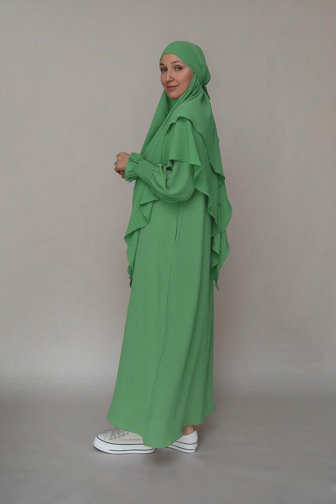 Front view of the Mint Green Non-Wrinkling Modest Gown by Annah Hariri