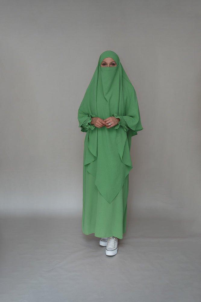 Detailed sleeve cuffs on the Mint Green Modest Gown