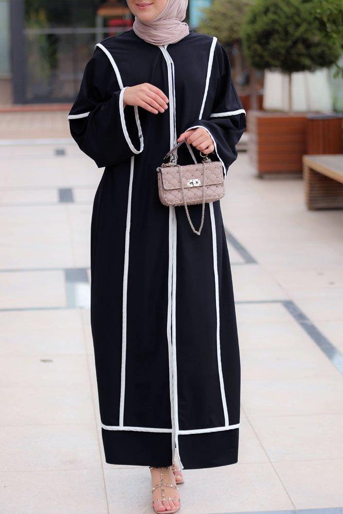 Full-length shot of the Modern Black Abaya featuring sleek white trims