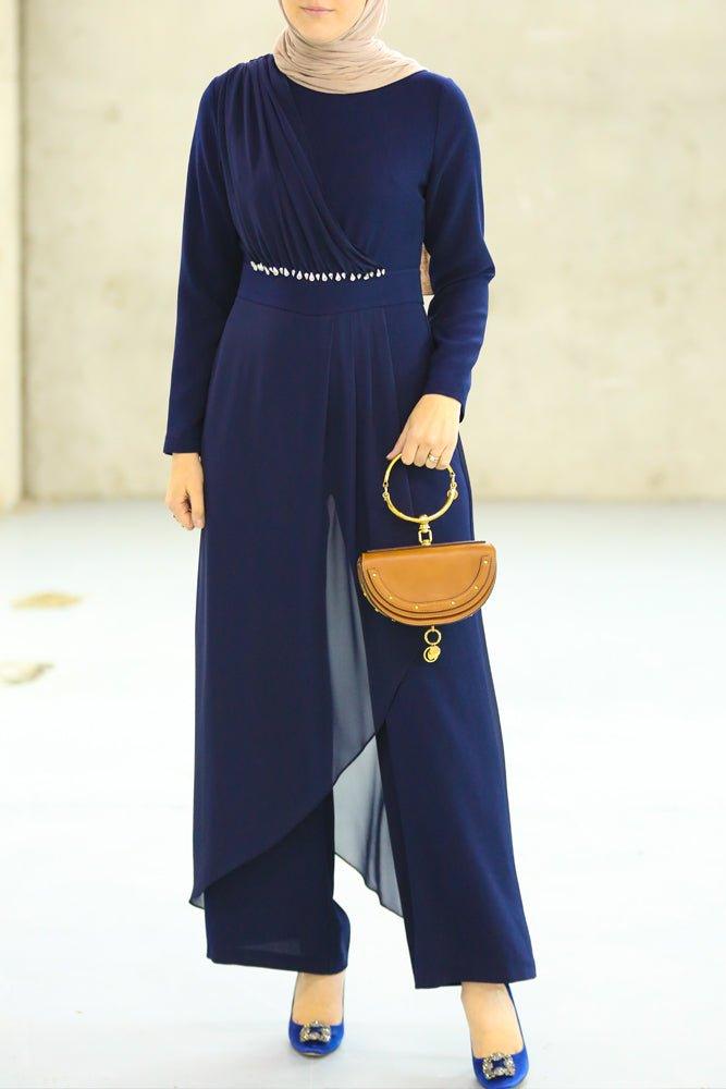 Full body shot of navy blue modest jumpsuit
