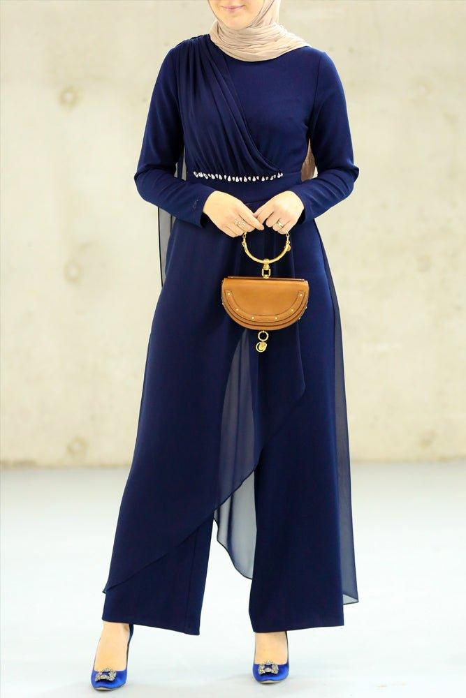 Side profile view of navy blue modest jumpsuit