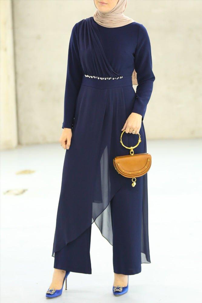 Close-up of stone embellishment on navy blue modest jumpsuit
