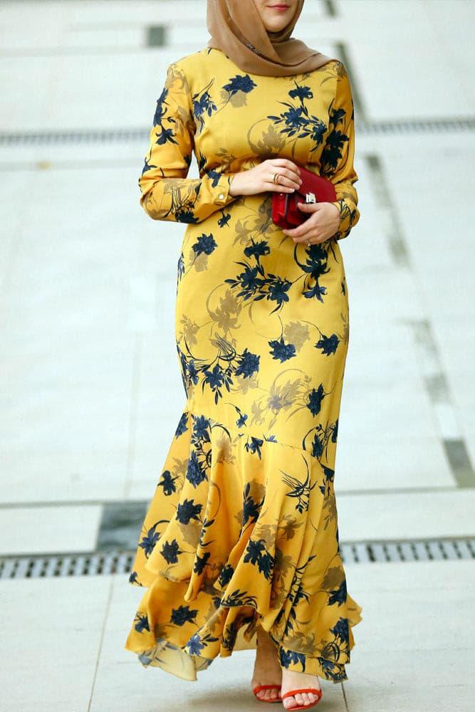 Close-up of the floral pattern on the Radiant Yellow Floral Satin Maxi Dress