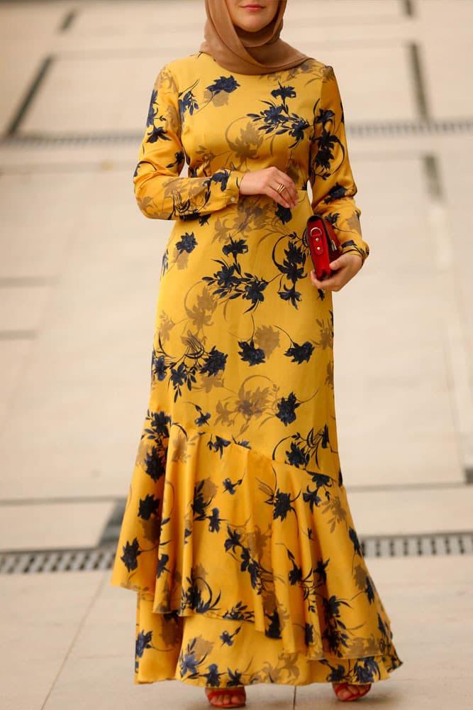 Detailed view of the floral pattern on the Radiant Yellow Satin Maxi Dress