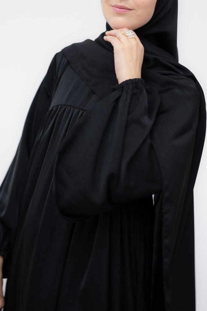 Sophie modest loose dress with pockets and elasticated wrist band in black - ANNAH HARIRI