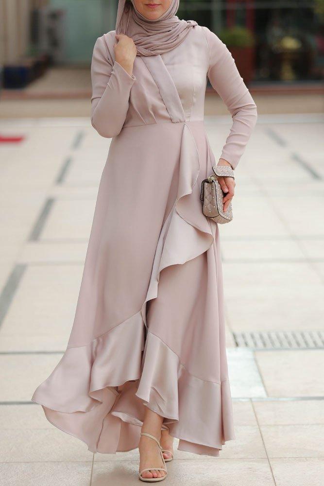 Side view of beige satin dress showcasing elegant ruffle design